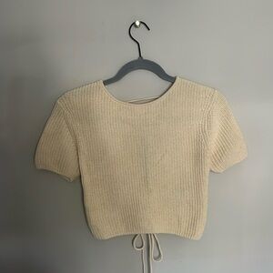cream short sleeve sweater with lace up back